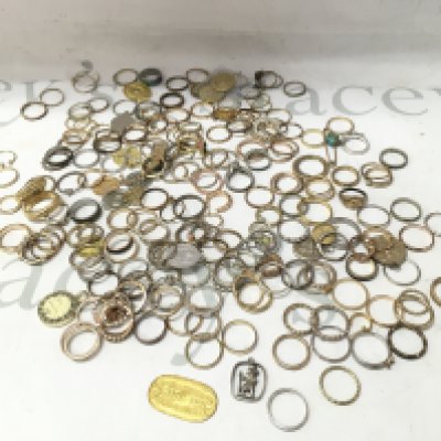 A collection of assorted costumes jewellery including rings earrings pendants etc including some silver examples.