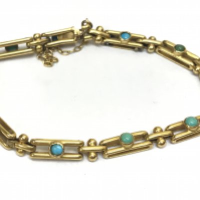 An Edwardian turquoise stone set bracelet . Postage category A