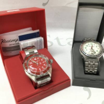 Boxed Vostok Sea Captain Amphibian Automatic Self-Winding Russian Diver Watch and a red Vostok Komandirskie Mechanical Automatic watch. Postage category B