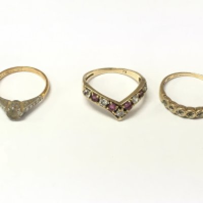 An 18ct gold and platinum stone set ring 1.83g and two 9ct gold stone set rings 3.49g Postage A