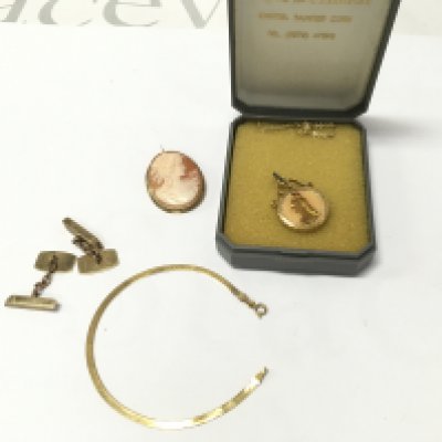 A collection of 9ct gold items including bracelets cufflinks brooch and a 9ct gold mount with enamel coin. Postage B