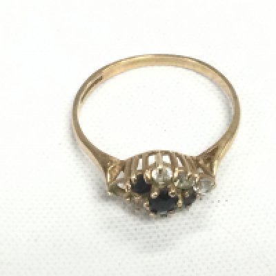 A 9ct gold ring set with stones, approx 1.4g and approx size N-O. Shipping category A.- NO RESERVE
