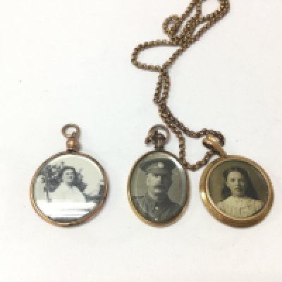 Three vintage lockets one with chain. Postage B- NO RESERVE