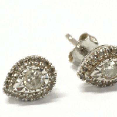 9ct gold tear drop diamond studs, one damaged . Total weight 1.18g . Postage category A- NO RESERVE