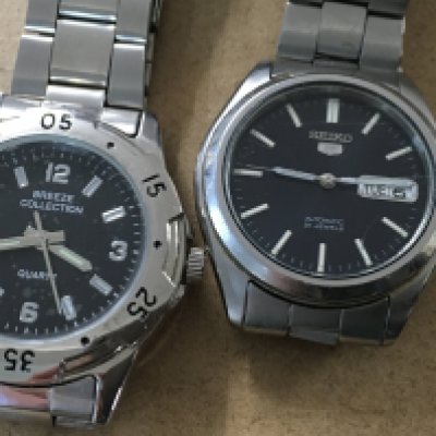 A collection of cufflinks a silver pendant on chain and two watches.- NO RESERVE