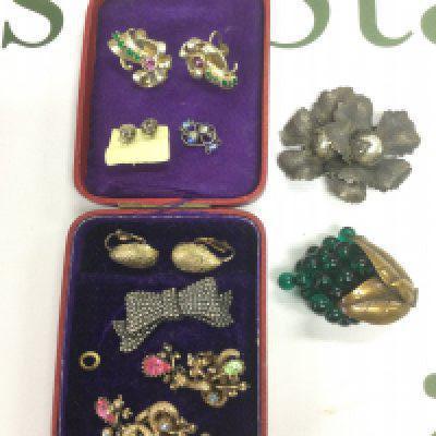 A small collection of jewellery comprising an American designer brooch by Coro, a pair of earrings etc. Shipping category A.-