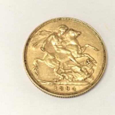An 1894 full sovereign. Postage A
