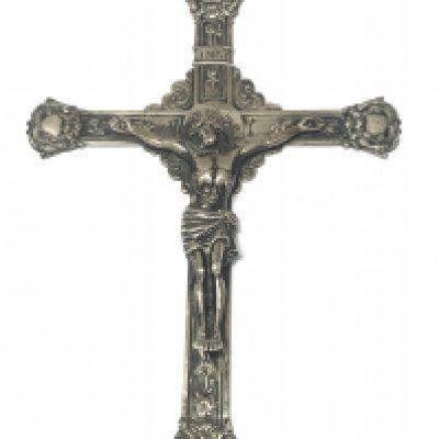 A silver crucifix 20cm tall 13cm wide , postage category B