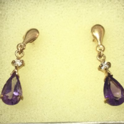 A pair of 9ct gold amethyst drop earrings. Postage B