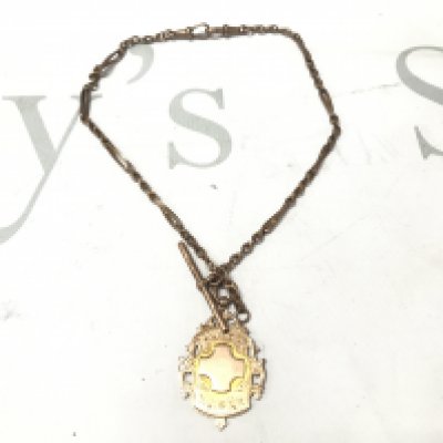 A 9ct gold watch chain with a 9ct gold pendant attached. 16.79g Postage A