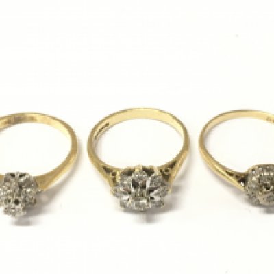 Three 18ct gold diamond rings. Size M M 1/2 and N. 9.1g Postage A