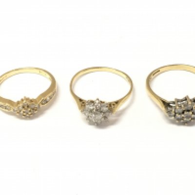 Three 18ct gold diamond cluster rings. Sizes J 1/2 M 1/2 and O. 7.19g Postage A