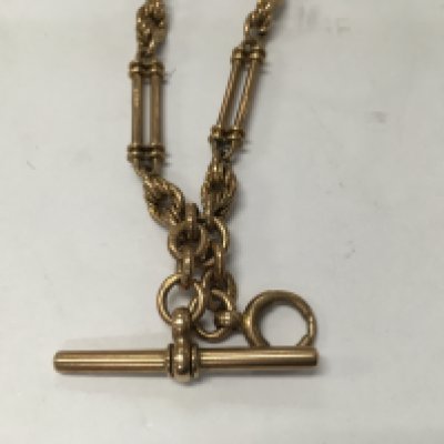 A 9ct gold watch chain with attached 37.6 grams