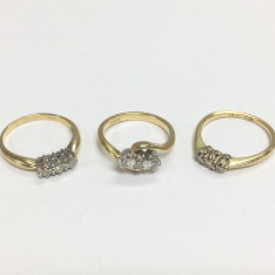 Three 18ct gold three stone diamond rings, approx sizes M, N and N-O. Total approx weight 9g. Shipping category A.