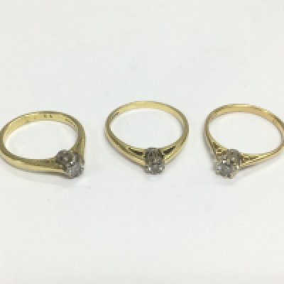 Three 18ct diamond solitaire rings, approx sizes L, O and N. Total approx 7.6g. Shipping category A.