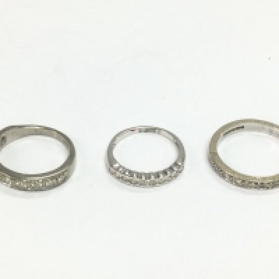 Three 18ct white gold half hoop rings, approx sizes I, L and O. Total approx 9.3g. Shipping category A.