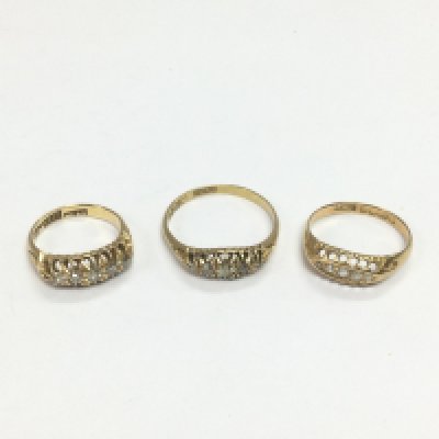 Three 18ct gold five stone diamond rings, approx sizes I, S and L-M. Approx total 9.4g. Shipping category A.