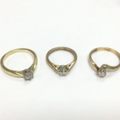 Three 9ct gold diamond solitaire rings, approx sizes P, J and N. Total approx 7.9g. Shipping category A.