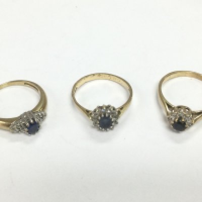Three 9ct gold sapphire and diamond cluster rings, approx sizes K, M and L-M. Total approx 5.8g. Shipping category A.
