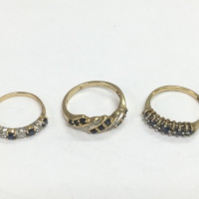 Three 9ct gold rings set with diamonds and sapphires, approx sizes L, I and M. Total approx 5.6g. Shipping category A.