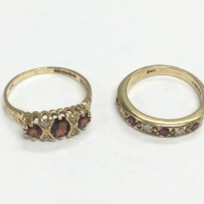 Two 9ct gold rings set with diamonds and garnets, approx sizes J and M. Total approx 4.2g. Shipping category A.