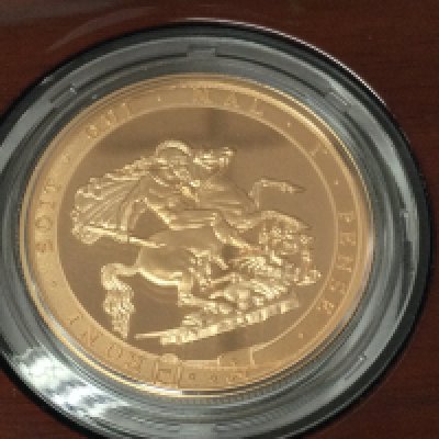 A 2017 five sovereign piece brilliant uncirculated coin with COA.Postage B