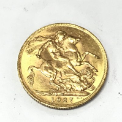 A 1927 full sovereign with South Africa mint mark. Postage A