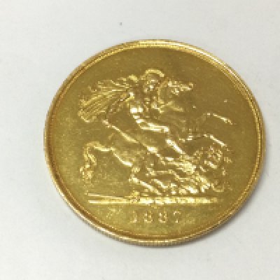 A 1887 five sovereign piece.Postage A