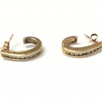 A pair of 9ct gold hoop diamond chip earrings. 3.56g Postage B