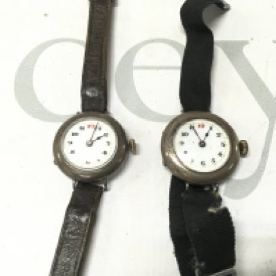 Two vintage silver cased watches. Postage B