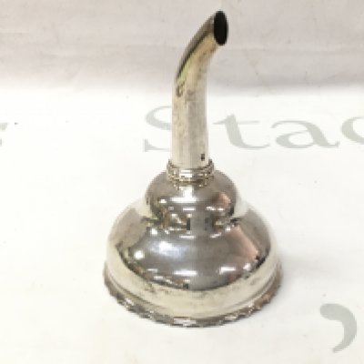 An 18th century silver wine funnel.