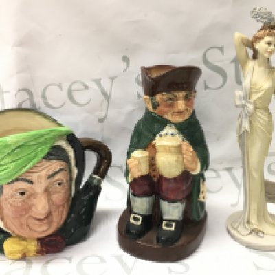 Two Doulton Toby jugs and a resin Doulton Theresa figure . This lot cannot be posted