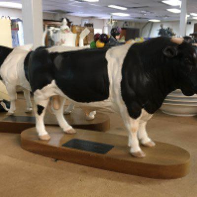 Beswick cow and calf and Friesian bull .