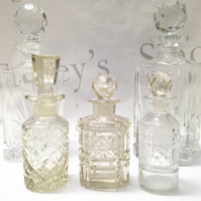 Two French decanters and three cut glass scent bottles . 14 to 26cm tall This lot cannot be posted