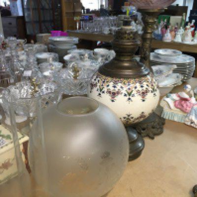 Two victorian style oil lamps .