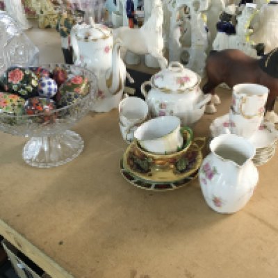 A collection of assorted ceramics and cut glass including cups and saucers horse figurines etc.