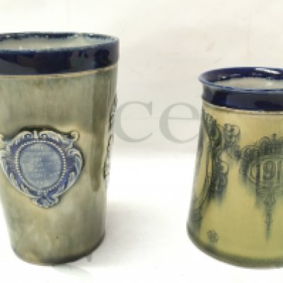 Royal Doulton 1911 Coronation cup and mug. 12.5cm tall 10cm tall. This lot cannot be posted