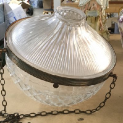 A 1940s cut glass lamp shade with copper finished mounts and chains with additional homophone pressed glass cover. 32cm diameter x 34cm depth. Slight rim chips.