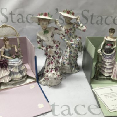 Two worcester lady figures and two other lady figures.