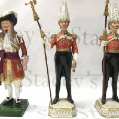 Three dresden early 20th century soldier figures.