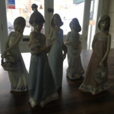 Five Lladro figures of maidens with flowers