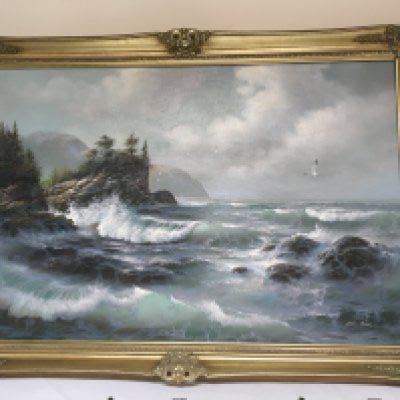 A Gilt framed oil painting on canvas study of breaking waves across a rocky shore signed July Amrick. NO RESERVE. 104x73cm