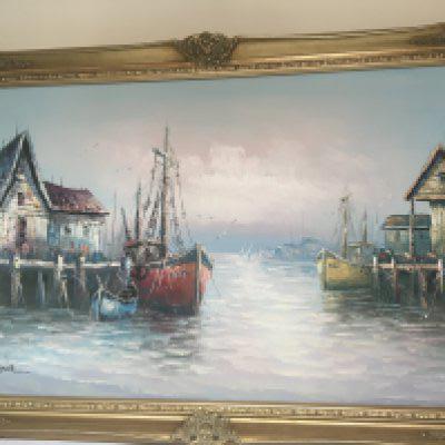 A framed oil painting on canvas study of moored sailing boats signed Florence. In a gilt frame. No Reserve. 95x75cm