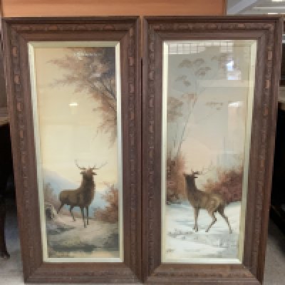 a Pair of opal framed highland Autumn and Winter stag scenes. 112cm x 53cm.