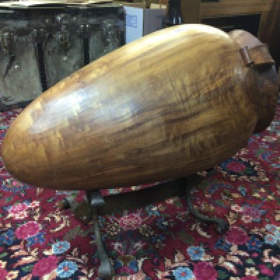 An unusual large carved wood Vessel on a crafted bispoke wrought metal copper stand. Length 80cm- NO RESERVE