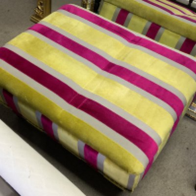 A modern upholstered footstool.- NO RESERVE