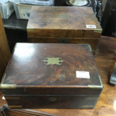A walnut writing box with fitted interior and a brass bound mahogany box
