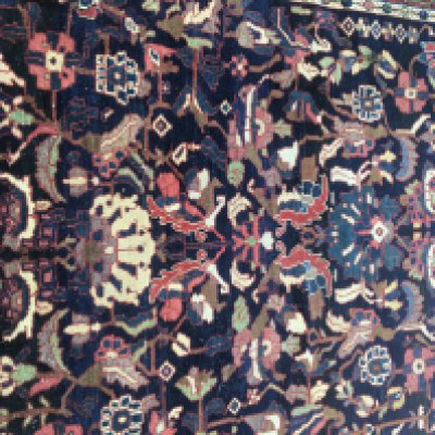 A Persian rug with floral central field and a geometric boarder . 210cm x 138 cm .