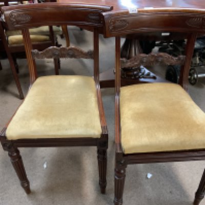 A set of 4 regency mahogany dining chairs.