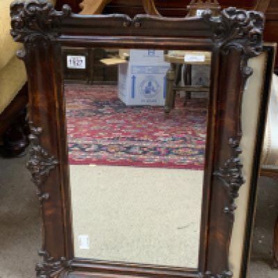 An antique wood effect mirror together with a coloured aquatint view of the quadrangle at Windsor castle.